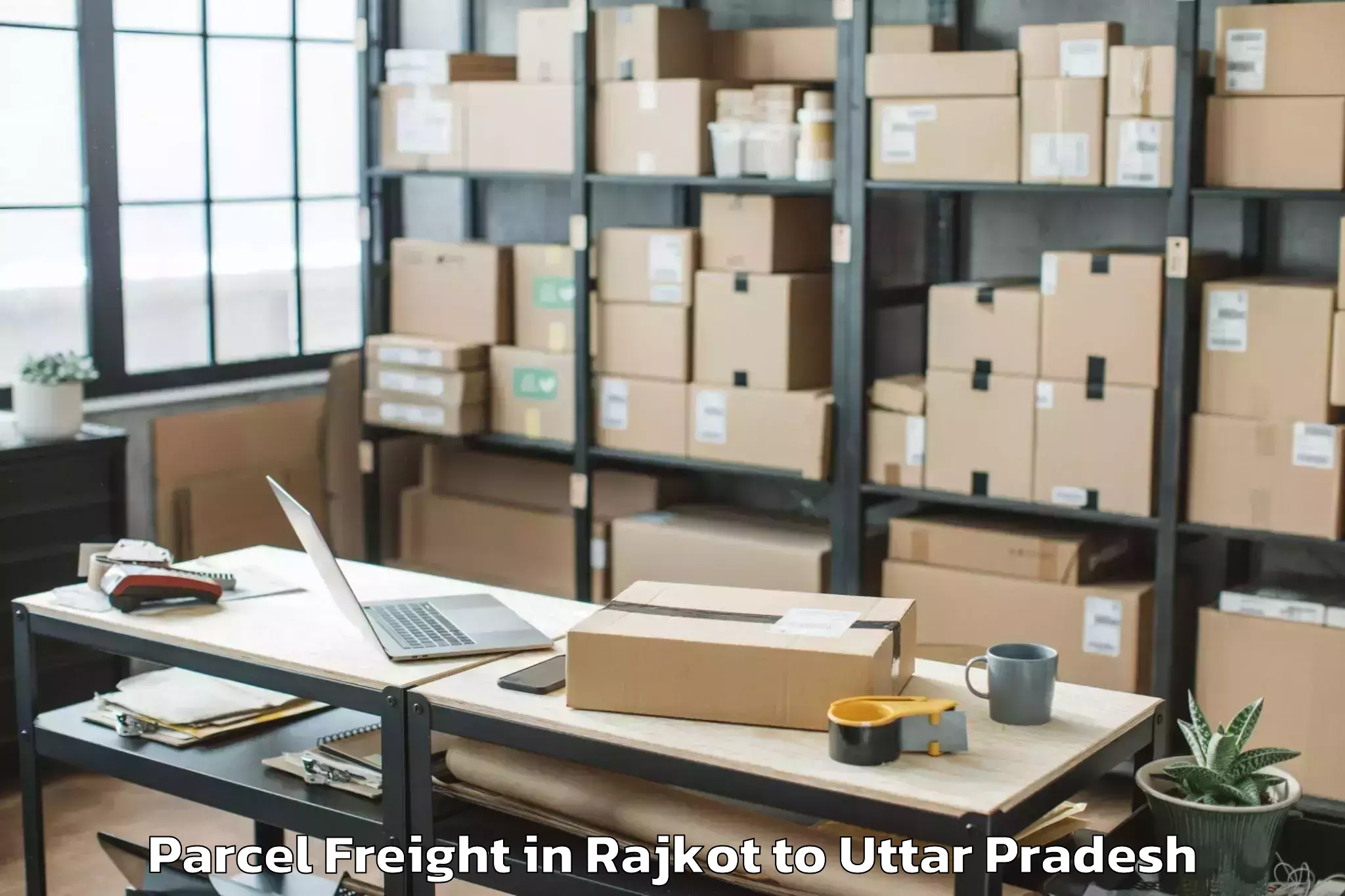 Professional Rajkot to Chillupar Parcel Freight